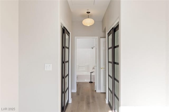 7155 S Durango Dr Unit 309, Las Vegas, NV 89113 - corridor featuring light wood finished floors