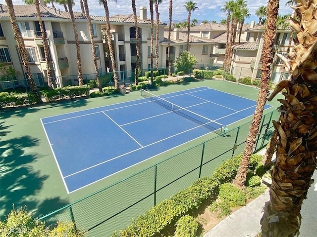7155 S Durango Dr Unit 309, Las Vegas, NV 89113 - view of tennis court with a residential view