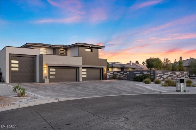 4050 N Tomsik St, Las Vegas, NV 89129 - contemporary home with driveway and a garage