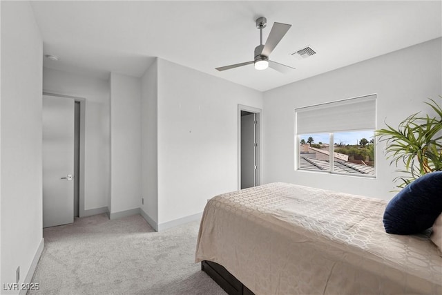 4050 N Tomsik St, Las Vegas, NV 89129 - bedroom with light carpet, baseboards, and a ceiling fan