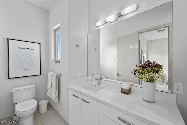 4050 N Tomsik St, Las Vegas, NV 89129 - bathroom with toilet, vanity, and baseboards
