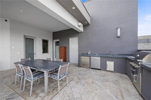 4050 N Tomsik St, Las Vegas, NV 89129 - view of patio featuring area for grilling, outdoor dining space, and a sink