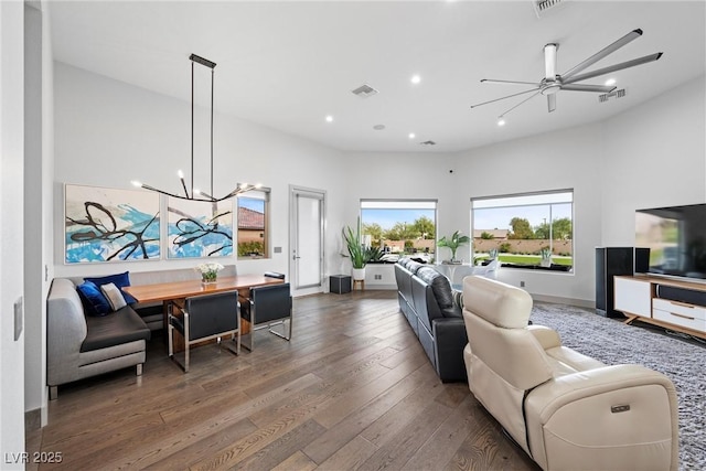 4050 N Tomsik St, Las Vegas, NV 89129 - living room featuring wood-type flooring, recessed lighting, ceiling fan, and a chandelier