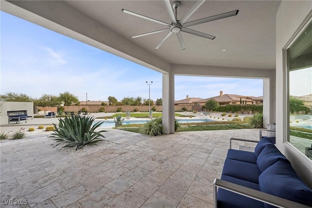 4050 N Tomsik St, Las Vegas, NV 89129 - view of patio / terrace featuring a ceiling fan, an outdoor pool, and an outdoor hangout area
