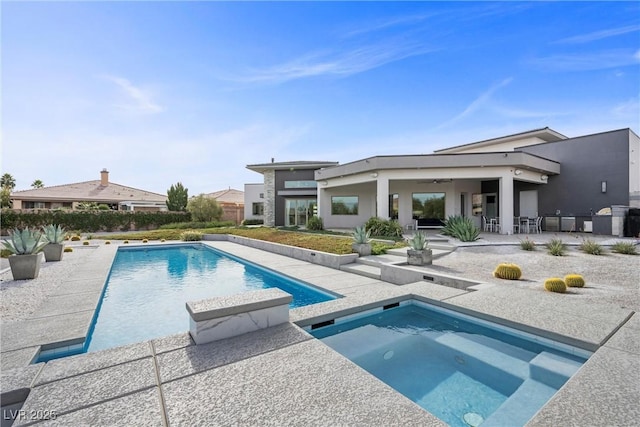 4050 N Tomsik St, Las Vegas, NV 89129 - swimming pool with an in-ground hot tub, a patio, and a ceiling fan