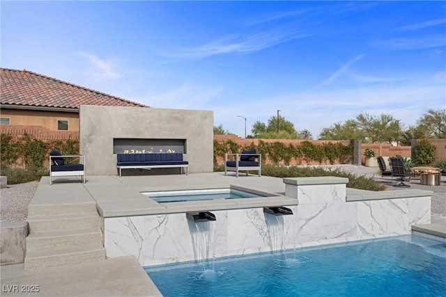 4050 N Tomsik St, Las Vegas, NV 89129 - view of pool featuring exterior fireplace, a patio area, and an in-ground hot tub