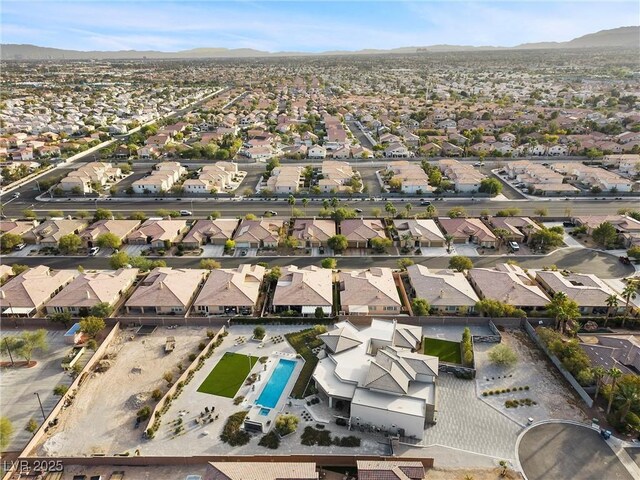 4050 N Tomsik St, Las Vegas, NV 89129 - view of property location featuring a mountain backdrop, nearby suburban area, and a pool area