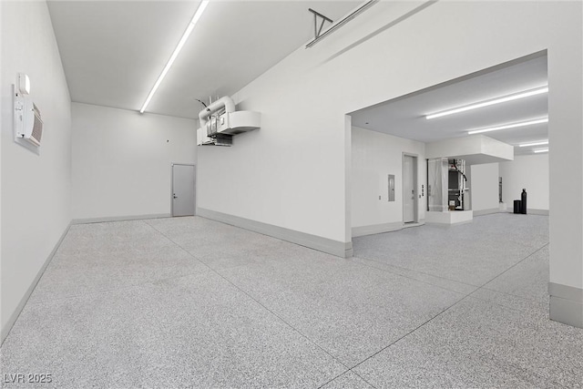 4050 N Tomsik St, Las Vegas, NV 89129 - garage featuring baseboards
