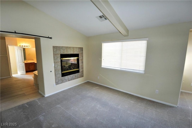 5808 Amber Station Ave, Las Vegas, NV 89131 - unfurnished living room with carpet floors, a fireplace, and baseboards