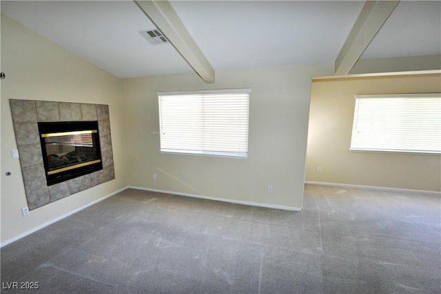 5808 Amber Station Ave, Las Vegas, NV 89131 - unfurnished living room featuring a fireplace, carpet, healthy amount of natural light, and baseboards
