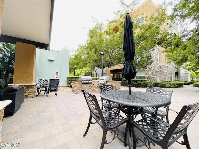 62 E Serene Ave Unit 115, Las Vegas, NV 89123 - view of patio featuring outdoor dining area