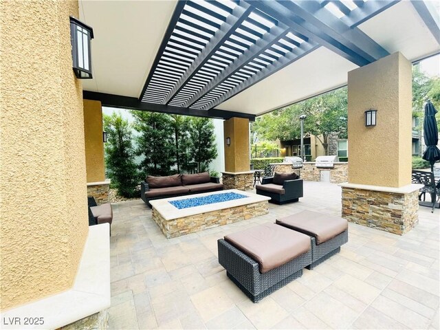 62 E Serene Ave Unit 115, Las Vegas, NV 89123 - view of patio / terrace featuring an outdoor kitchen, an outdoor living space with a fire pit, and a pergola