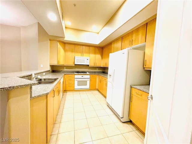62 E Serene Ave Unit 115, Las Vegas, NV 89123 - kitchen with white appliances, a sink, light tile patterned flooring, a peninsula, and light stone countertops