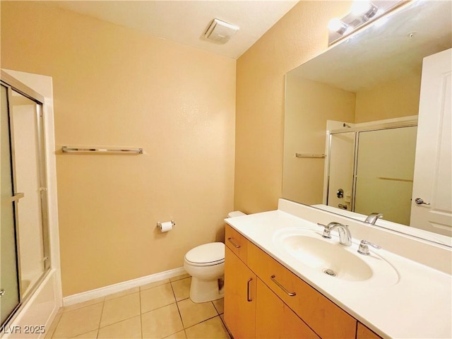 62 E Serene Ave Unit 115, Las Vegas, NV 89123 - full bathroom featuring vanity, tile patterned flooring, toilet, baseboards, and combined bath / shower with glass door