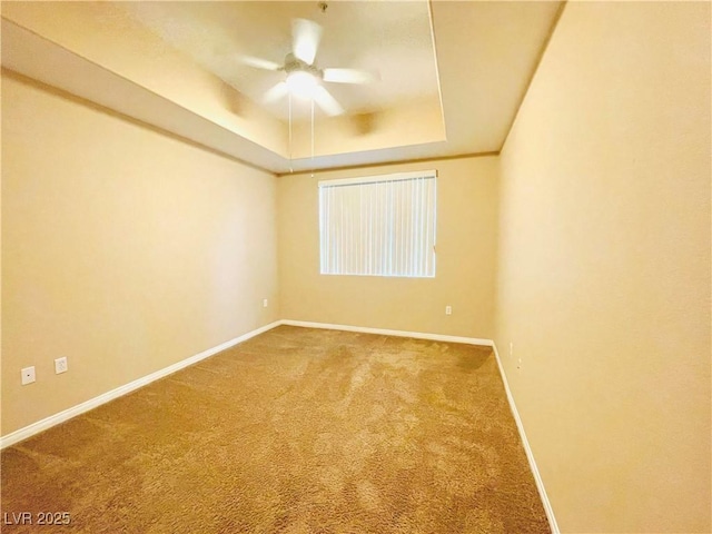 62 E Serene Ave Unit 115, Las Vegas, NV 89123 - carpeted spare room with a raised ceiling, baseboards, and ceiling fan