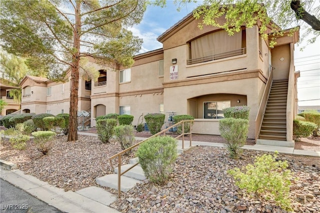 5751 E Hacienda Ave Unit 154, Las Vegas, NV 89122 - view of property with stairs
