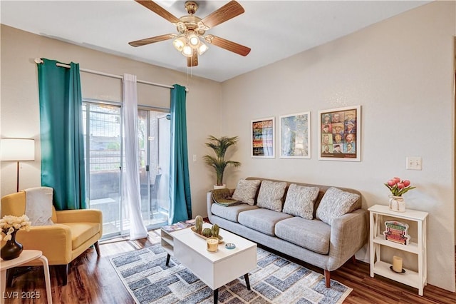 5751 E Hacienda Ave Unit 154, Las Vegas, NV 89122 - living area featuring wood finished floors and ceiling fan