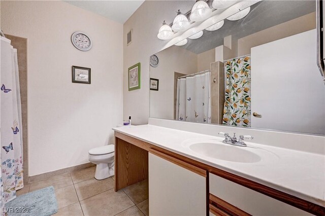 5751 E Hacienda Ave Unit 154, Las Vegas, NV 89122 - full bathroom with toilet, vanity, tile patterned flooring, and a shower with curtain