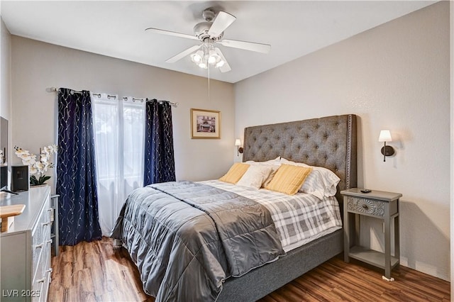 5751 E Hacienda Ave Unit 154, Las Vegas, NV 89122 - bedroom featuring wood finished floors and a ceiling fan