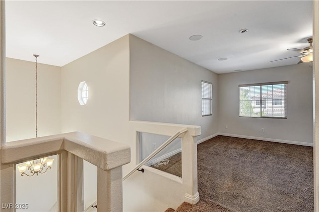 7637 Good Fortune Ct, Las Vegas, NV 89139 - hallway with carpet floors, baseboards, a chandelier, an upstairs landing, and recessed lighting