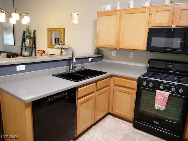 9705 Templemore Ave Unit 102, Las Vegas, NV 89129 - kitchen with black appliances, light brown cabinetry, a sink, a peninsula, and light countertops