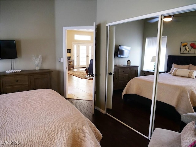 9705 Templemore Ave Unit 102, Las Vegas, NV 89129 - bedroom with a closet, dark wood finished floors, and french doors
