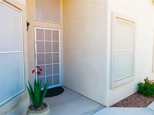 9705 Templemore Ave Unit 102, Las Vegas, NV 89129 - view of exterior entry featuring stucco siding