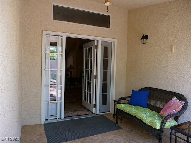 9705 Templemore Ave Unit 102, Las Vegas, NV 89129 - doorway to property featuring stucco siding