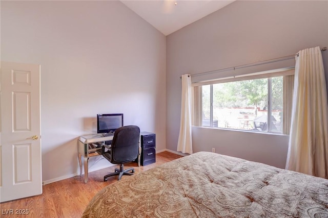 602 Painted Cloud Pl, Las Vegas, NV 89144 - bedroom with wood finished floors, baseboards, and high vaulted ceiling