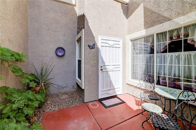 602 Painted Cloud Pl, Las Vegas, NV 89144 - entrance to property with stucco siding