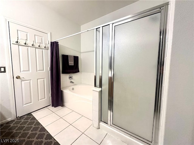 602 Painted Cloud Pl, Las Vegas, NV 89144 - full bathroom with a shower stall, a garden tub, and tile patterned flooring
