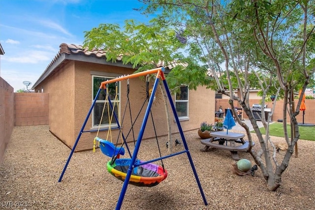 759 Star Apple Ln, Las Vegas, NV 89178 - view of jungle gym with a fenced backyard and a patio