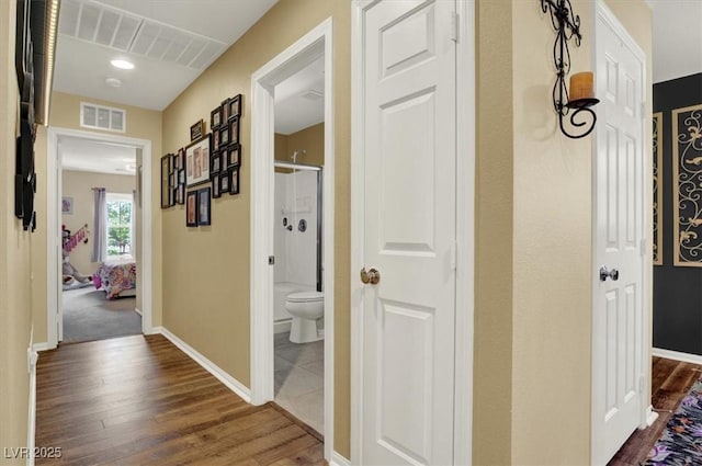 759 Star Apple Ln, Las Vegas, NV 89178 - hallway featuring dark wood-style floors and baseboards