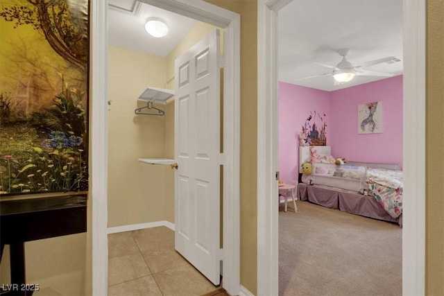759 Star Apple Ln, Las Vegas, NV 89178 - bedroom with light tile patterned flooring, ceiling fan, and baseboards