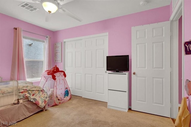 759 Star Apple Ln, Las Vegas, NV 89178 - bedroom with light colored carpet, a closet, and ceiling fan