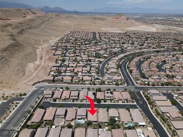 759 Star Apple Ln, Las Vegas, NV 89178 - aerial view of property's location with nearby suburban area and a mountain backdrop