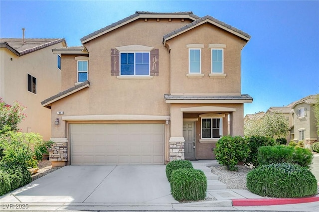 7963 Cape Brett St, Las Vegas, NV 89131 - view of front of home featuring stucco siding, stone siding, a garage, and driveway