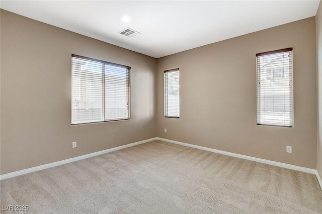 7963 Cape Brett St, Las Vegas, NV 89131 - spare room featuring light colored carpet, baseboards, and healthy amount of natural light