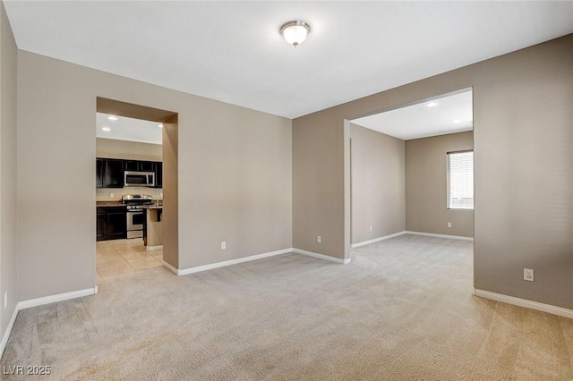 7963 Cape Brett St, Las Vegas, NV 89131 - empty room featuring light colored carpet, baseboards, and recessed lighting