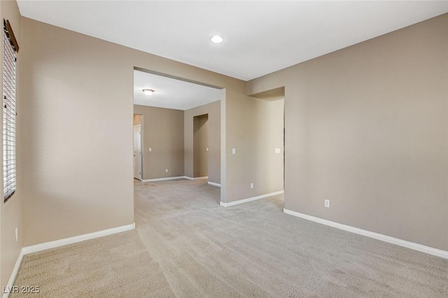 7963 Cape Brett St, Las Vegas, NV 89131 - spare room with baseboards, light colored carpet, and recessed lighting