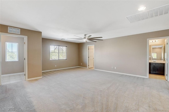 7963 Cape Brett St, Las Vegas, NV 89131 - empty room featuring baseboards, a ceiling fan, and light carpet