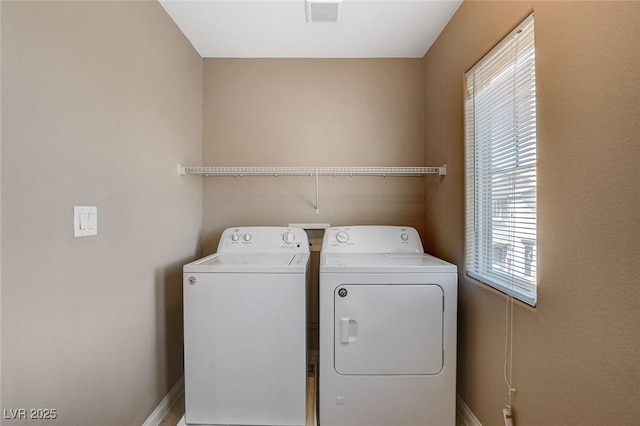 7963 Cape Brett St, Las Vegas, NV 89131 - washroom featuring separate washer and dryer and baseboards