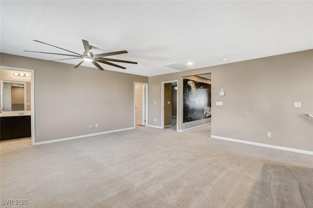 7963 Cape Brett St, Las Vegas, NV 89131 - unfurnished living room with a ceiling fan, baseboards, and light colored carpet