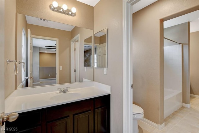 7963 Cape Brett St, Las Vegas, NV 89131 - bathroom featuring toilet, vanity, tub / shower combination, tile patterned floors, and baseboards