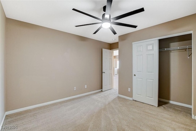 7963 Cape Brett St, Las Vegas, NV 89131 - unfurnished bedroom with light carpet, a closet, baseboards, and a ceiling fan