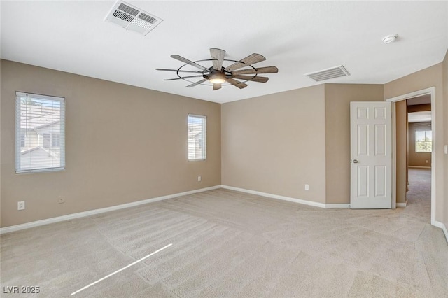 7963 Cape Brett St, Las Vegas, NV 89131 - spare room with ceiling fan, light carpet, and healthy amount of natural light