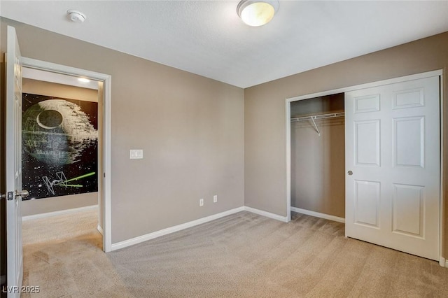 7963 Cape Brett St, Las Vegas, NV 89131 - unfurnished bedroom featuring light carpet, baseboards, and a closet
