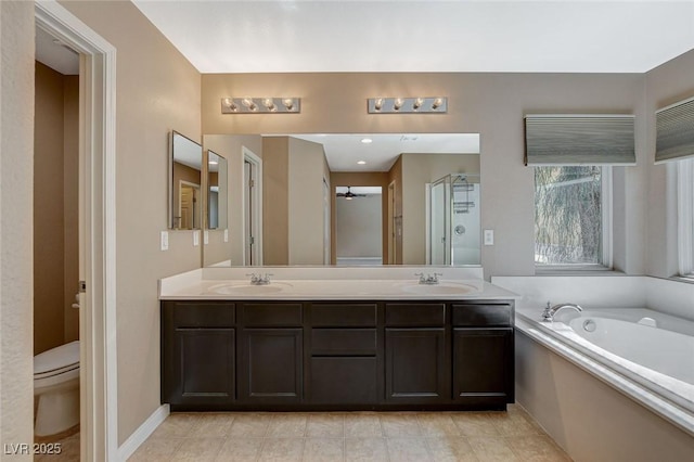 7963 Cape Brett St, Las Vegas, NV 89131 - full bathroom featuring double vanity, a garden tub, toilet, a shower with shower door, and a ceiling fan