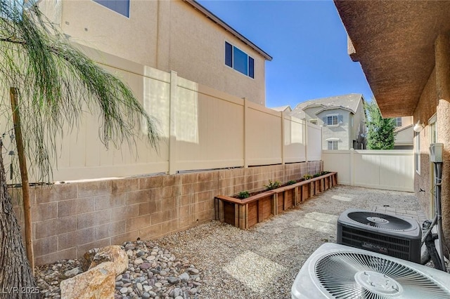 7963 Cape Brett St, Las Vegas, NV 89131 - fenced backyard featuring cooling unit
