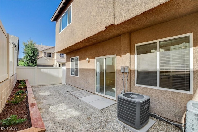 7963 Cape Brett St, Las Vegas, NV 89131 - fenced backyard featuring central AC unit and a patio